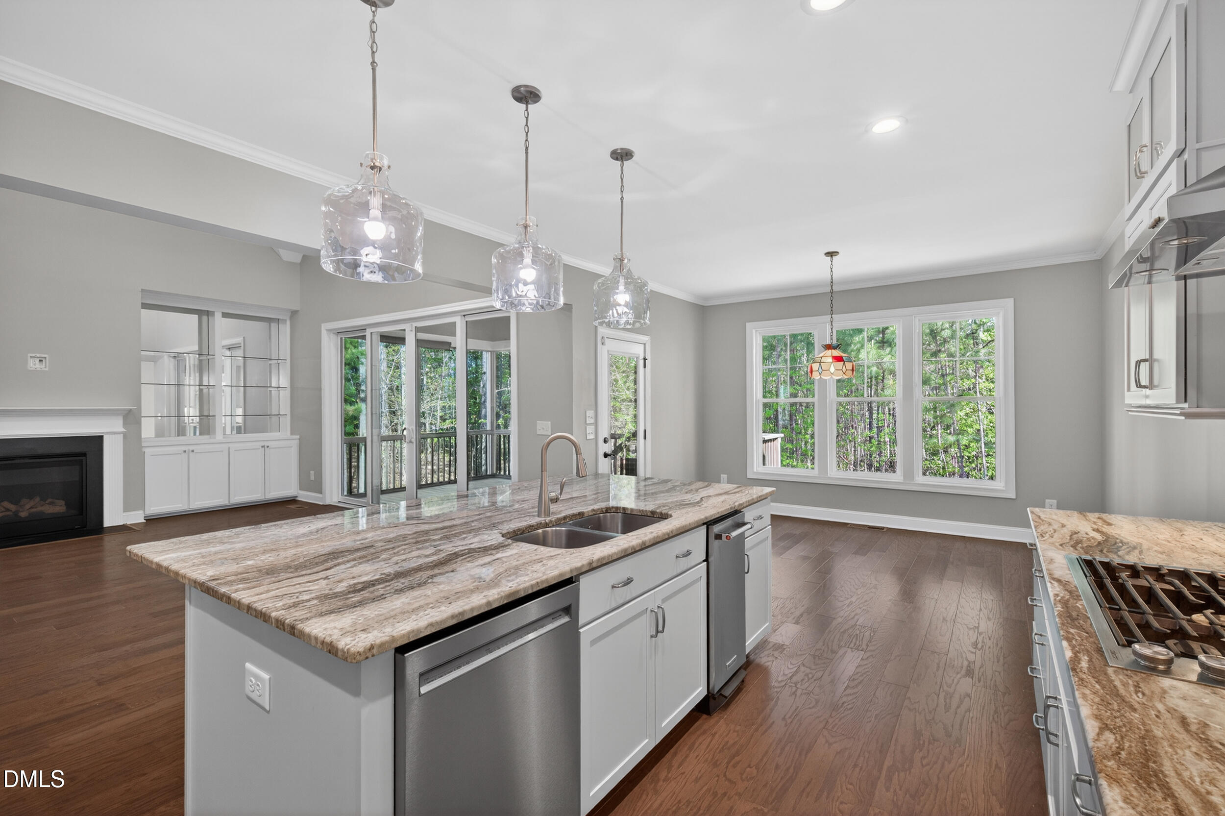 231 High Ridge Lane Pittsboro, NC 27312 - Photo 6 of 47 a open kitchen with granite countertop stove a sink and dishwasher with wooden floor