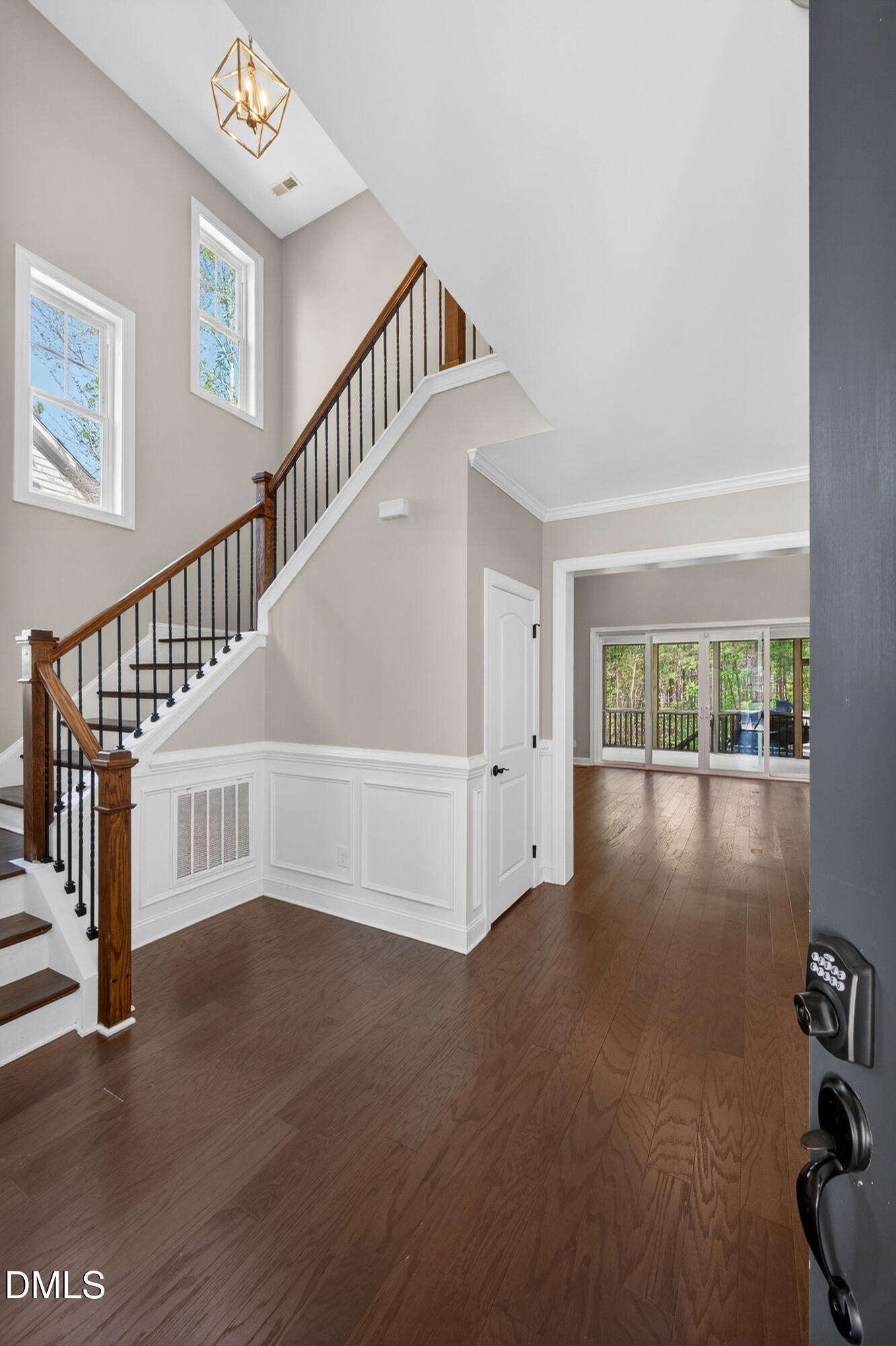 231 High Ridge Lane Pittsboro, NC 27312 - Photo 7 of 47 a view of staircase with white walls and windows