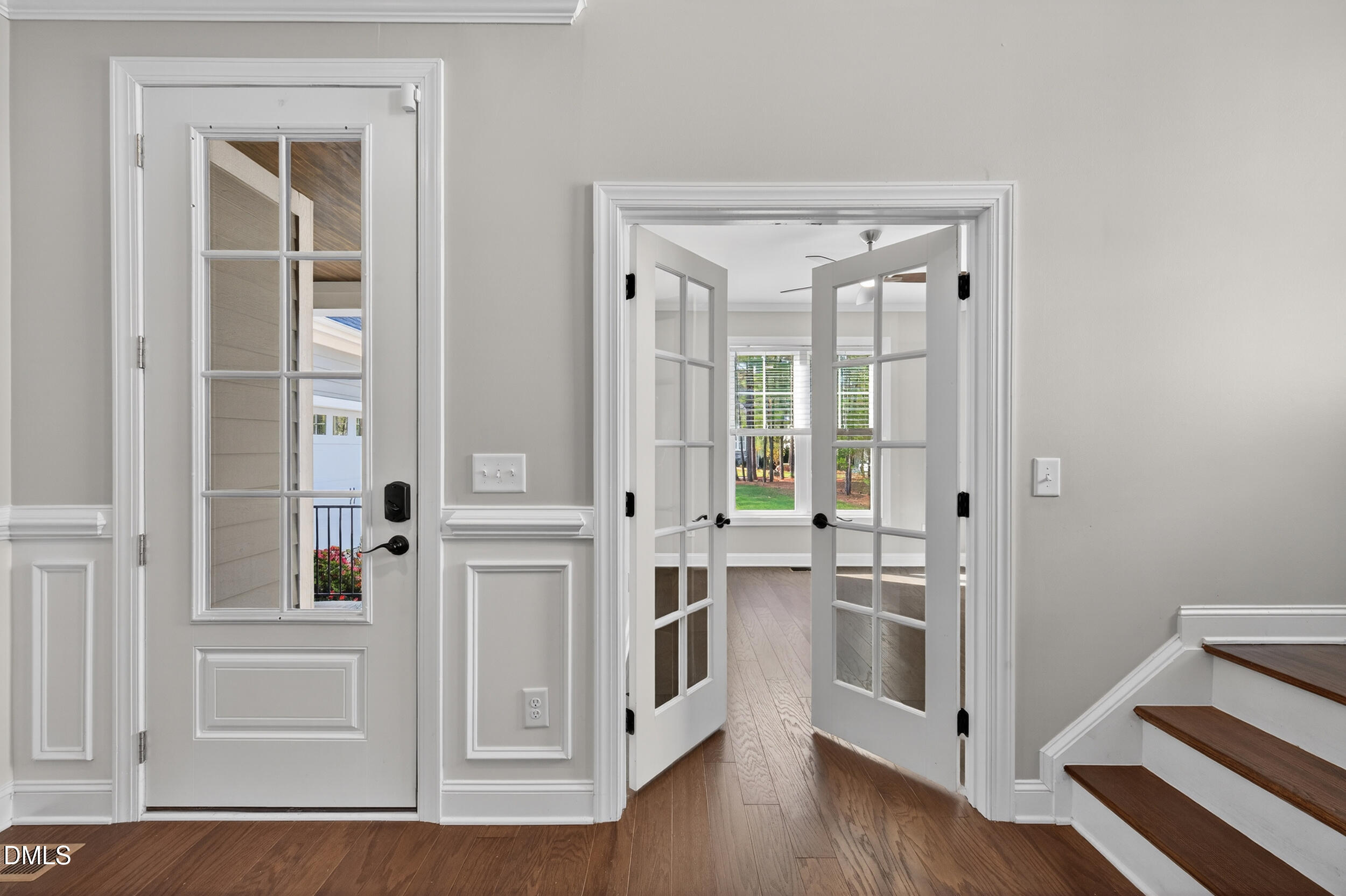 231 High Ridge Lane Pittsboro, NC 27312 - Photo 8 of 47 a view of a kitchen with a white cabinets and wooden floor