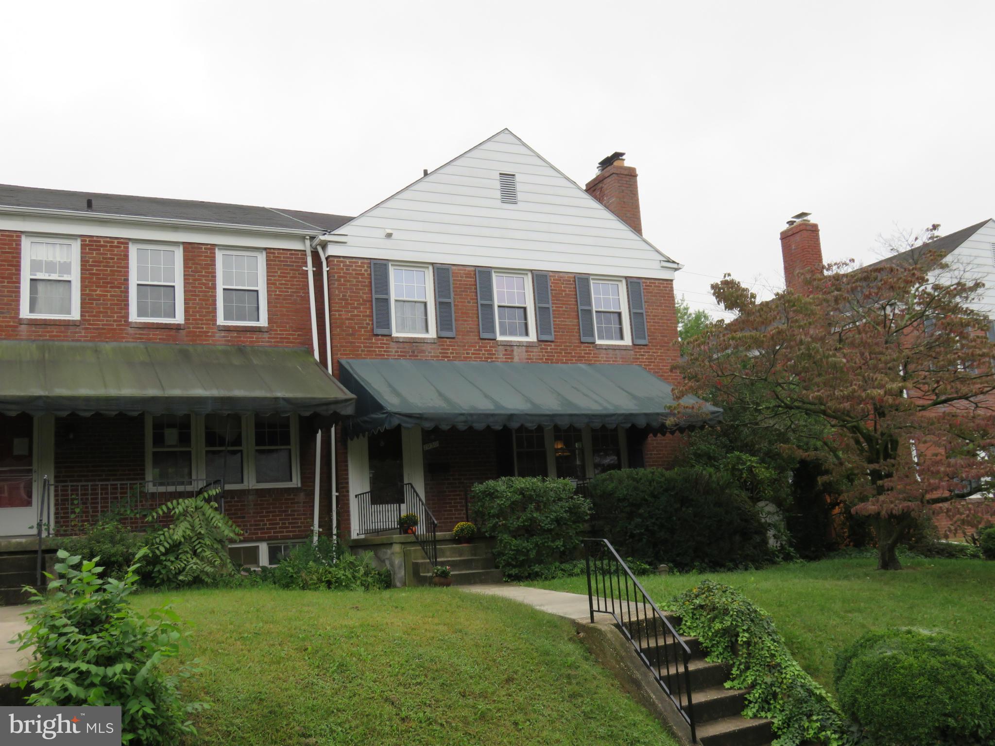 1930 Edgewood Road Baltimore, MD 21286 - Photo 1 of 30 a front view of a house with a yard