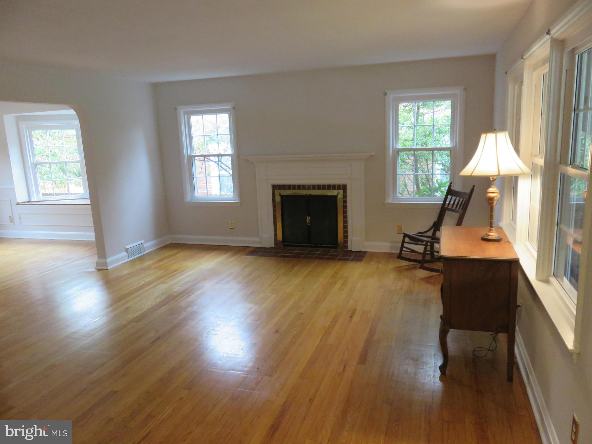 1930 Edgewood Road Baltimore, MD 21286 - Photo 3 of 30 a living room with furniture and a fireplace