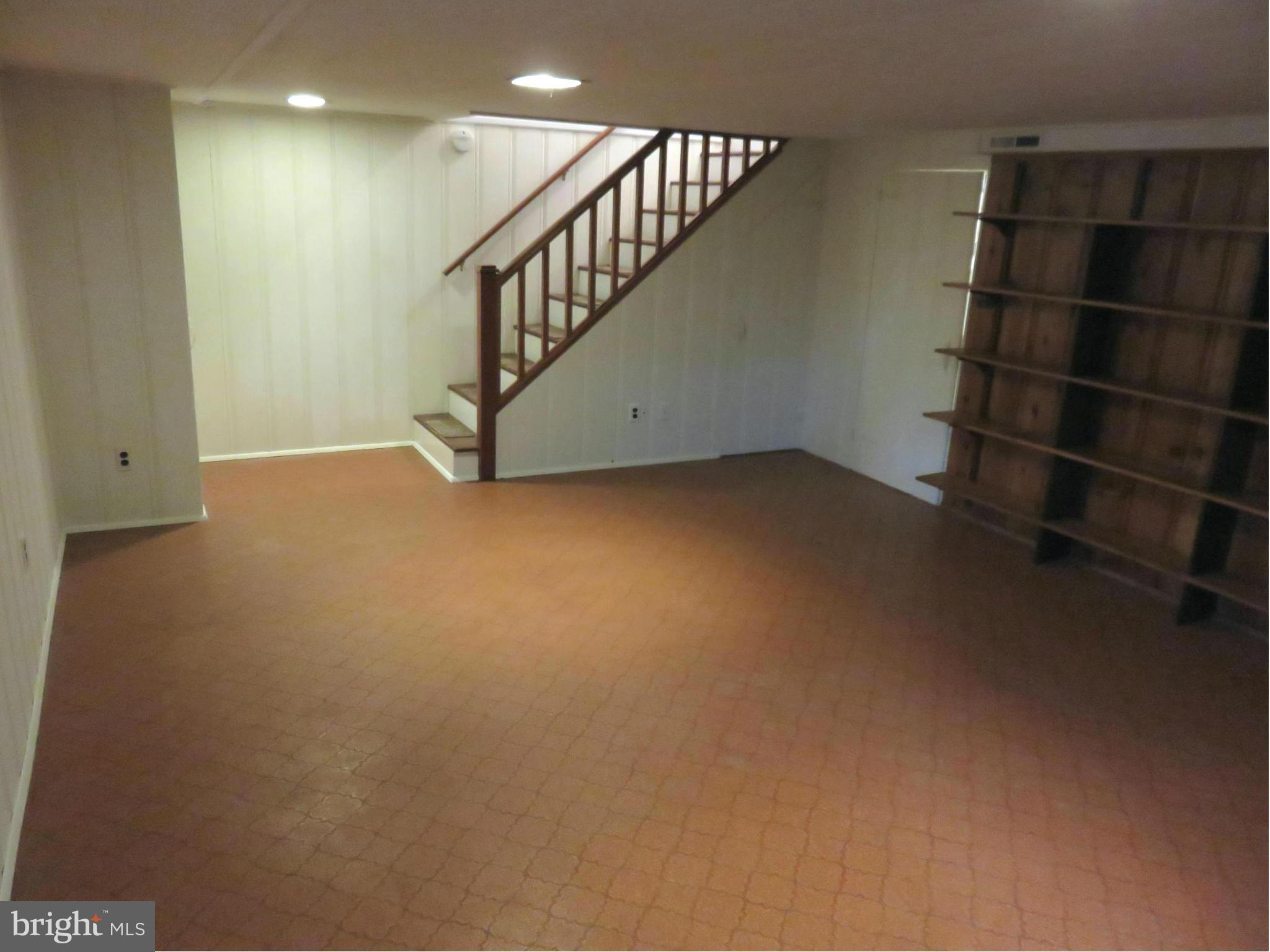1930 Edgewood Road Baltimore, MD 21286 - Photo 21 of 30 a view of an empty room with stairs