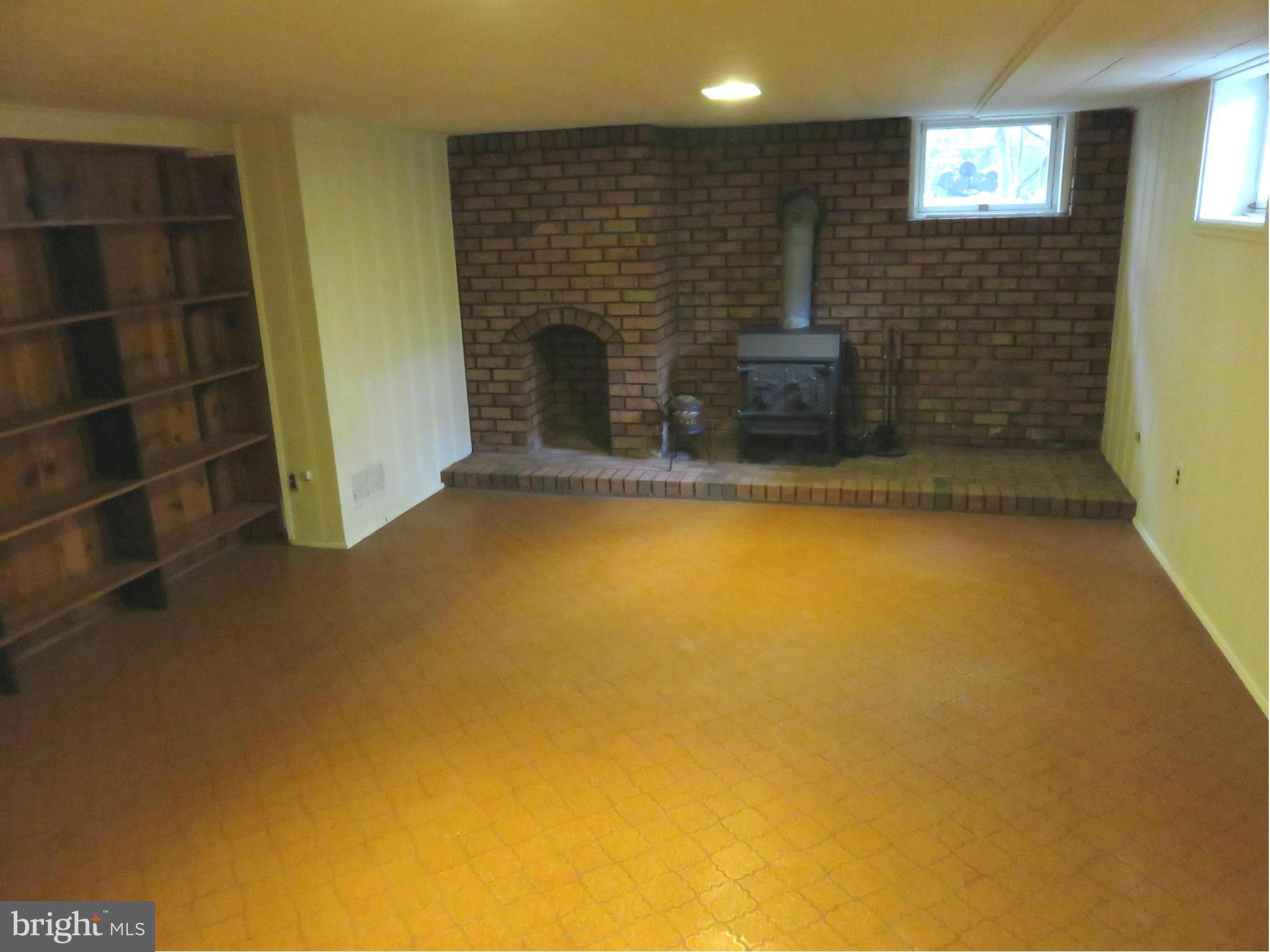 1930 Edgewood Road Baltimore, MD 21286 - Photo 22 of 30 a view of empty room with a fireplace