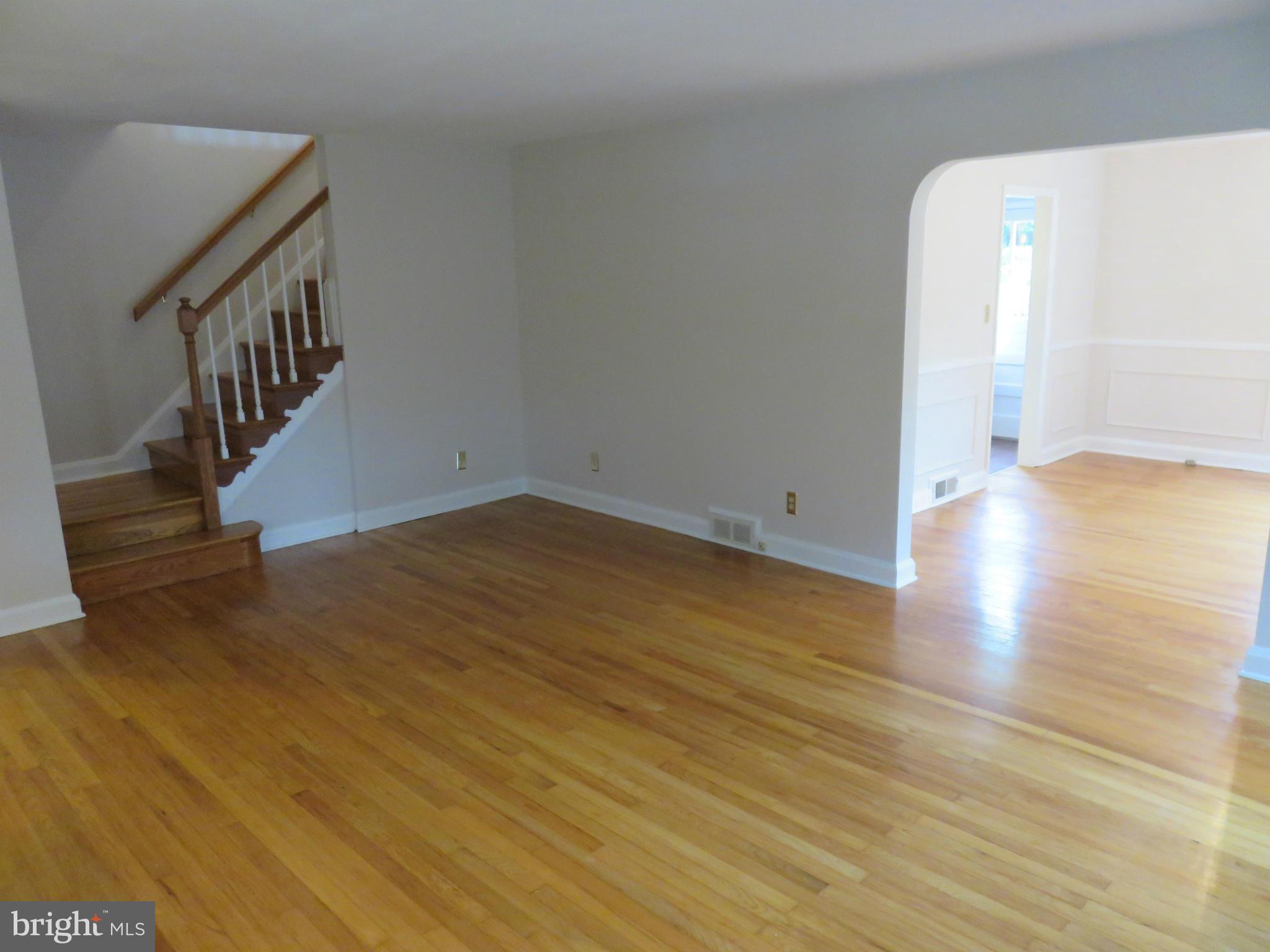 1930 Edgewood Road Baltimore, MD 21286 - Photo 6 of 30 a view of a room with wooden floor and white walls