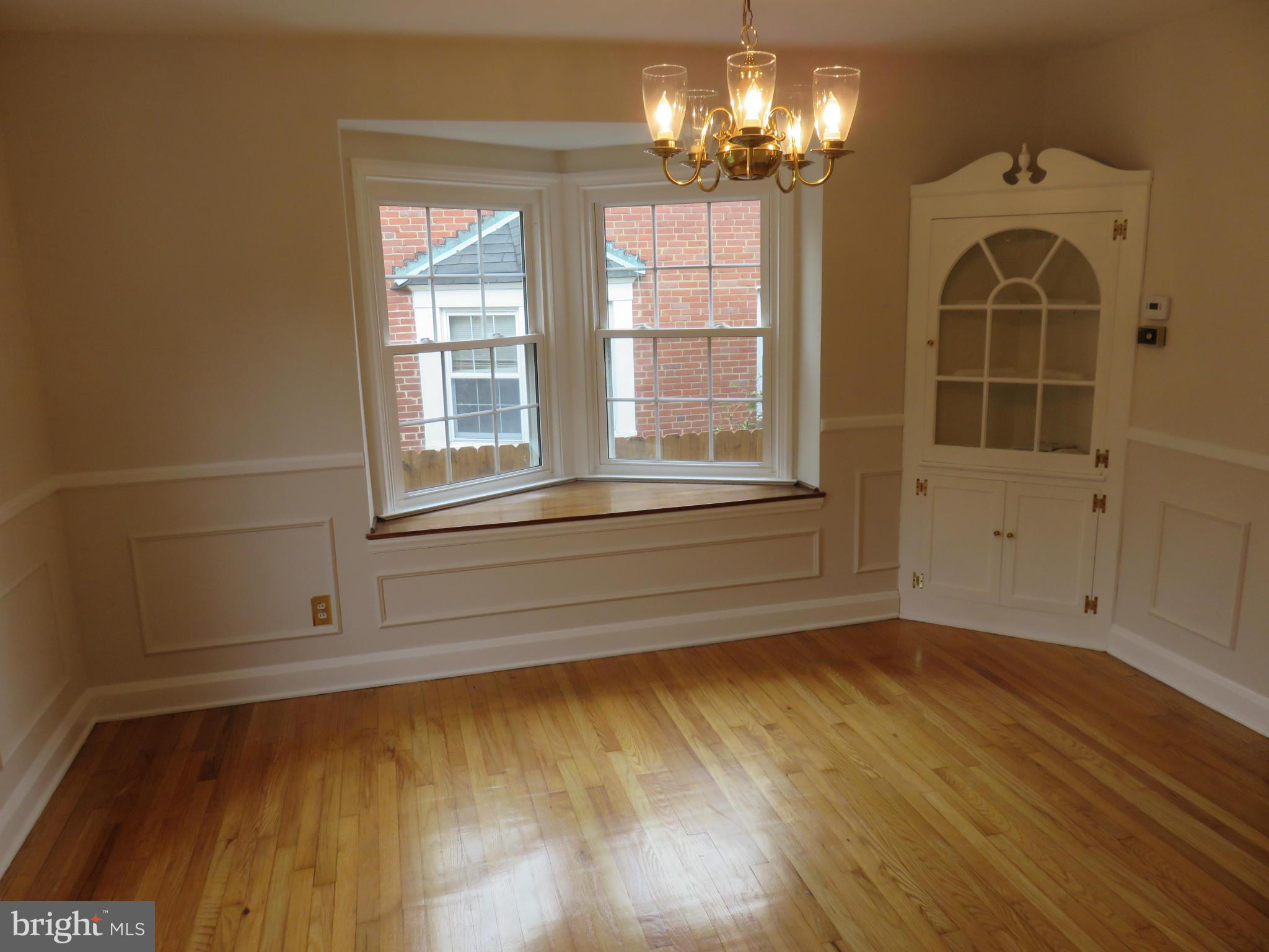 1930 Edgewood Road Baltimore, MD 21286 - Photo 9 of 30 a view of empty room with wooden floor and fan
