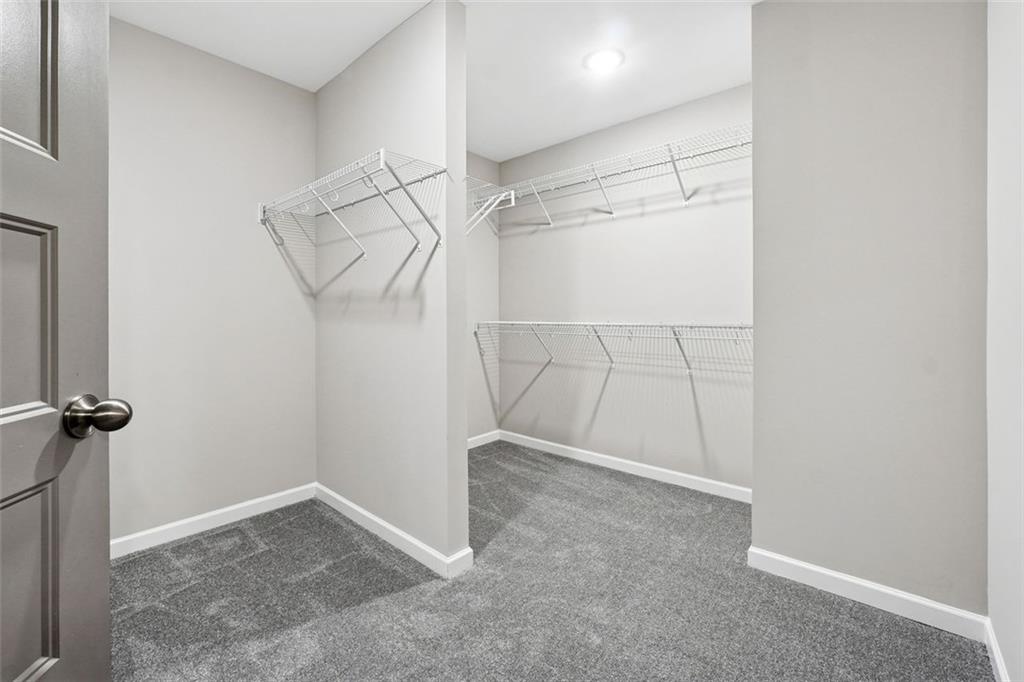 528 Clinton Drive Temple, GA 30179 - Photo 14 of 25 a view of a room with racks on the wall