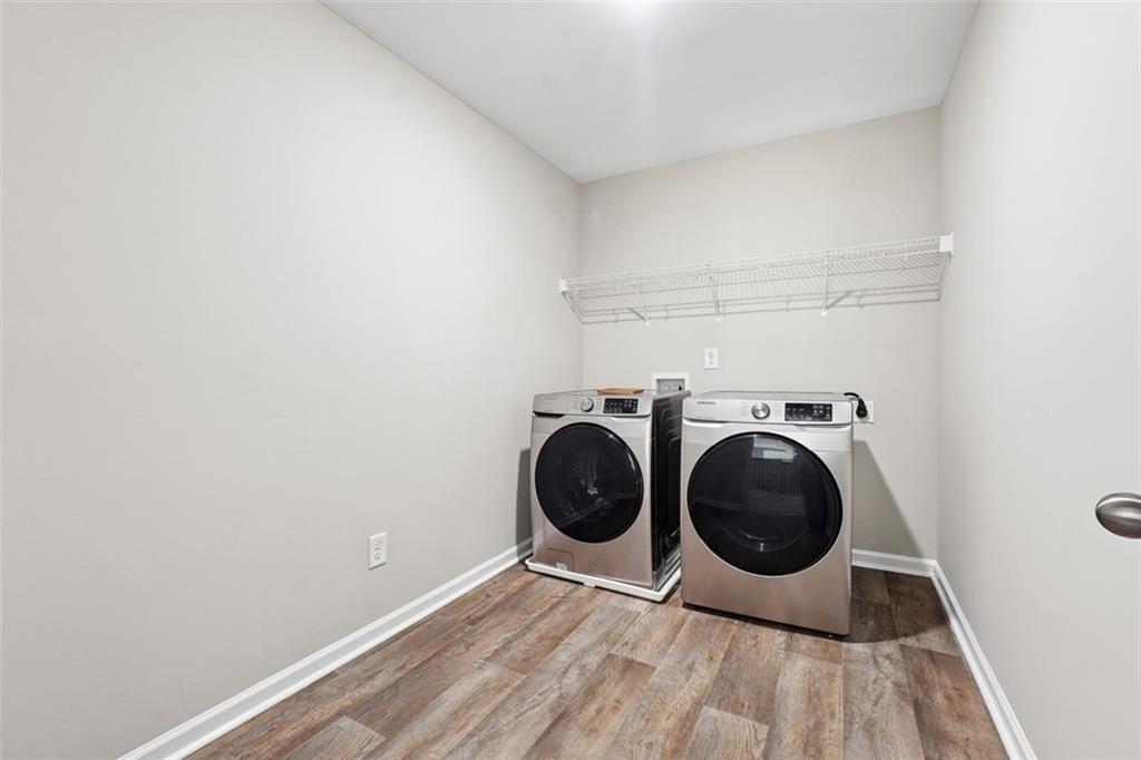 528 Clinton Drive Temple, GA 30179 - Photo 23 of 25 a view of a storage & utility room with wooden floor