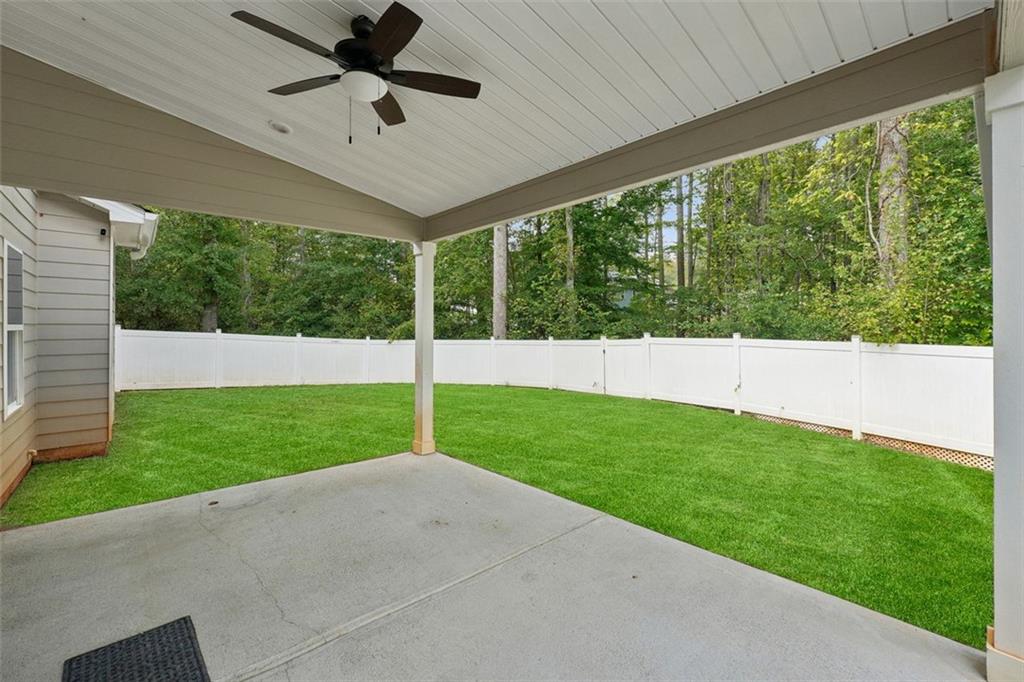 528 Clinton Drive Temple, GA 30179 - Photo 24 of 25 a view of an house with backyard and garden