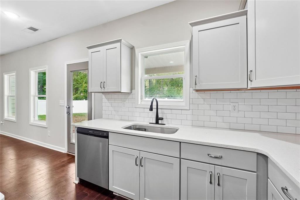 528 Clinton Drive Temple, GA 30179 - Photo 9 of 25 a kitchen with a sink cabinets and window