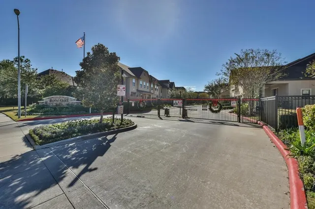 a view of a street with houses on the road
