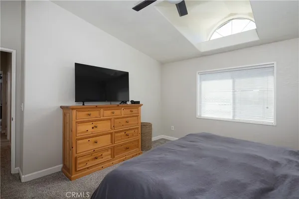 a room with furniture and flat screen tv