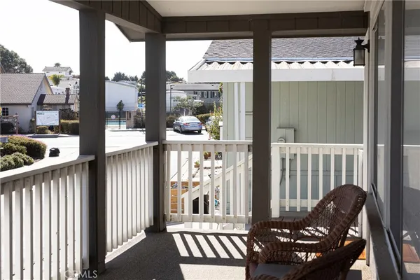 a view of a porch with furniture