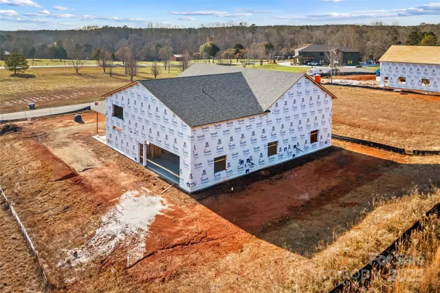 a view of a swimming pool with a terrace
