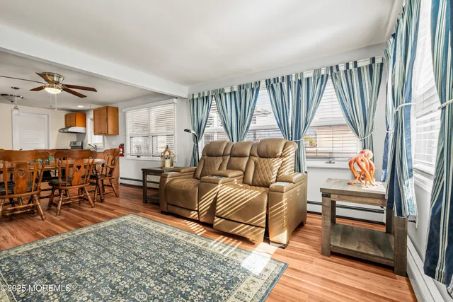 a kitchen with stainless steel appliances granite countertop a stove and a refrigerator