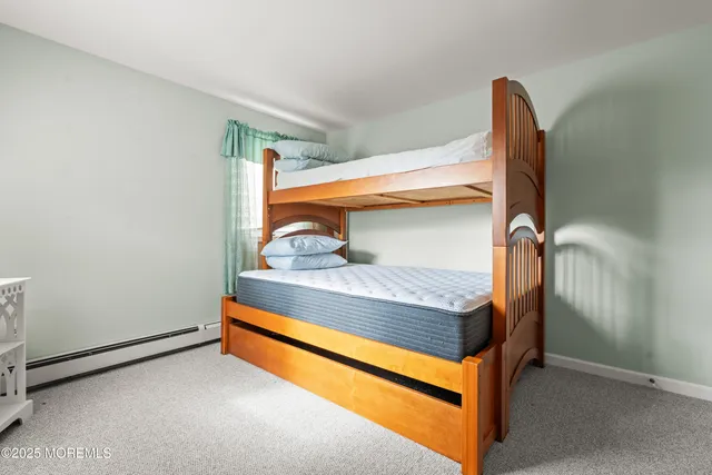 a bathroom with a shower and a tub