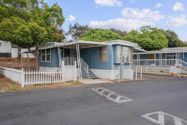 a front view of a house with a porch