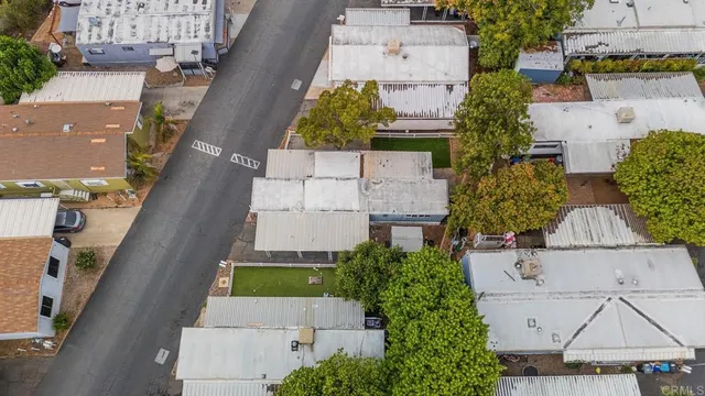an aerial view of a house with a garden