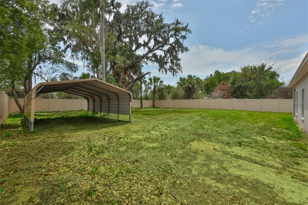 708 Coade Stone Drive Seffner, FL 33584 - Photo 34 of 48 a front view of a house with garden