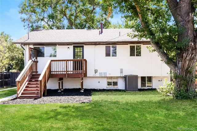 a house that has garden in front of it