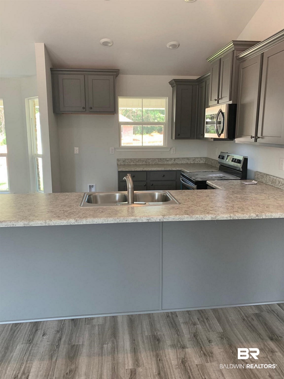 16196 Wishing Tree Court Foley, AL 36535 - Photo 5 of 6 kitchen flat bar