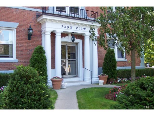 53 Prospect Street, Unit 411 Stamford, CT 06901 - Photo 1 of 1 a view of a house with potted plants and a table