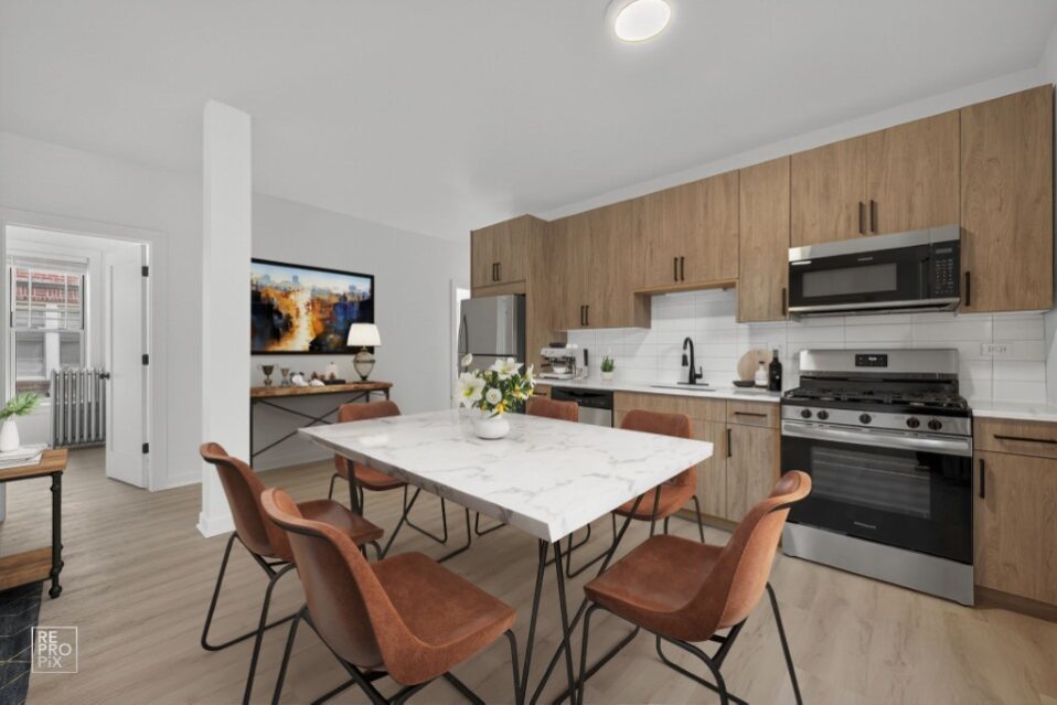 6975 North Bell Avenue, Unit 1 Chicago, IL 60645 - Photo 11 of 16 a kitchen with stainless steel appliances a stove top oven a sink dishwasher and a refrigerator with wooden floor