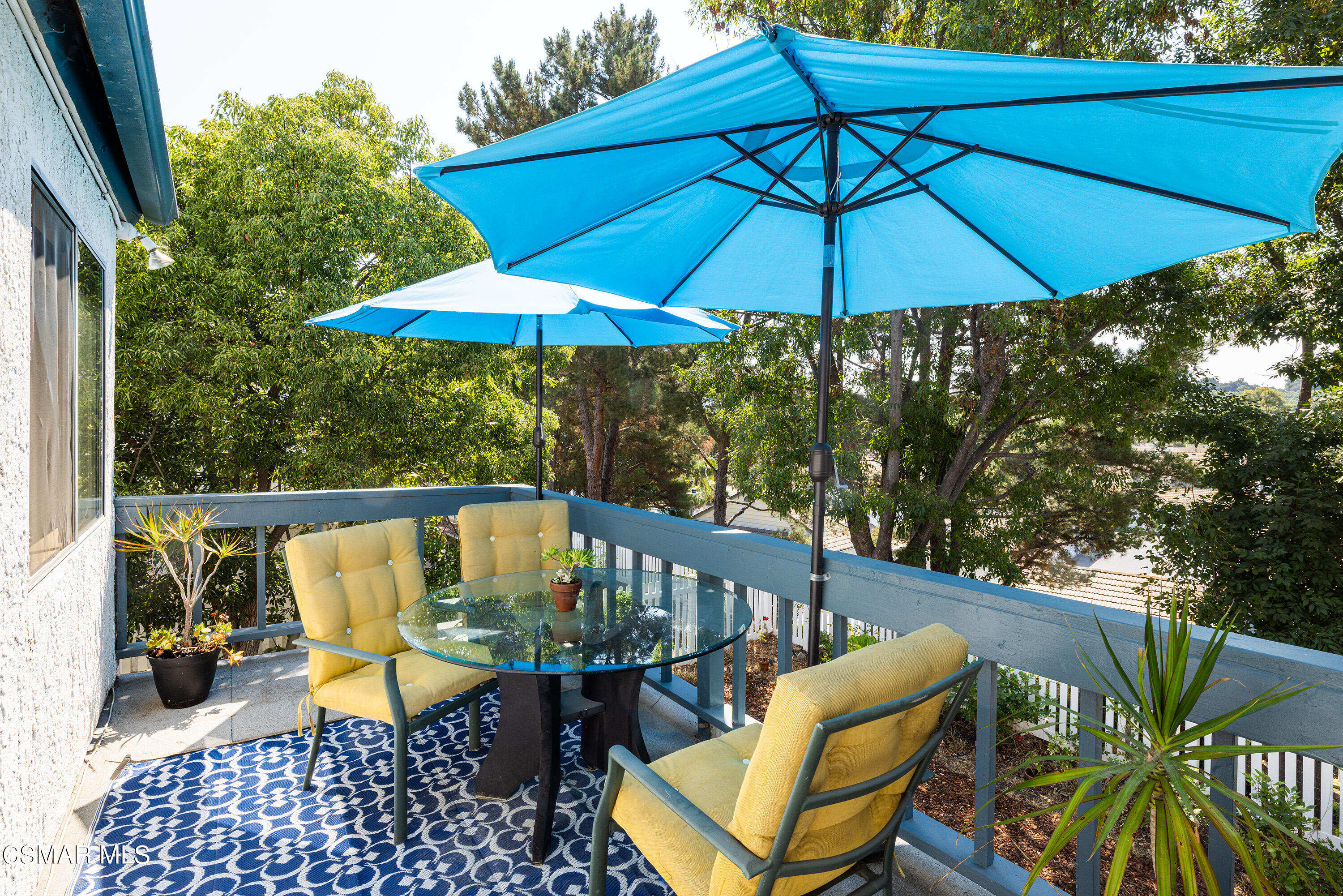 434 Algonquin Drive Simi Valley, CA 93065 - Photo 13 of 30 a view of an outdoor sitting area with furniture and umbrella