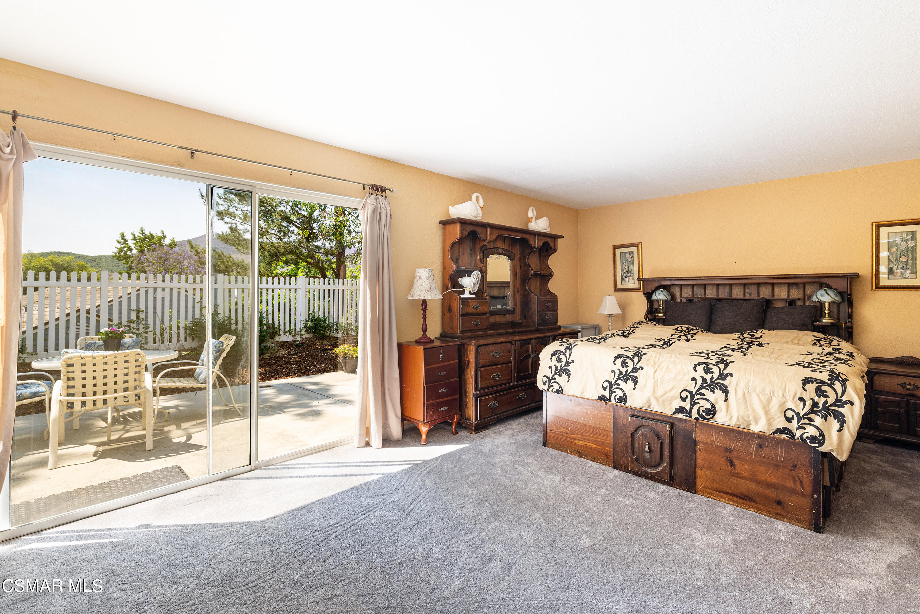 434 Algonquin Drive Simi Valley, CA 93065 - Photo 16 of 30 a bedroom with a large bed and a flat tv screen