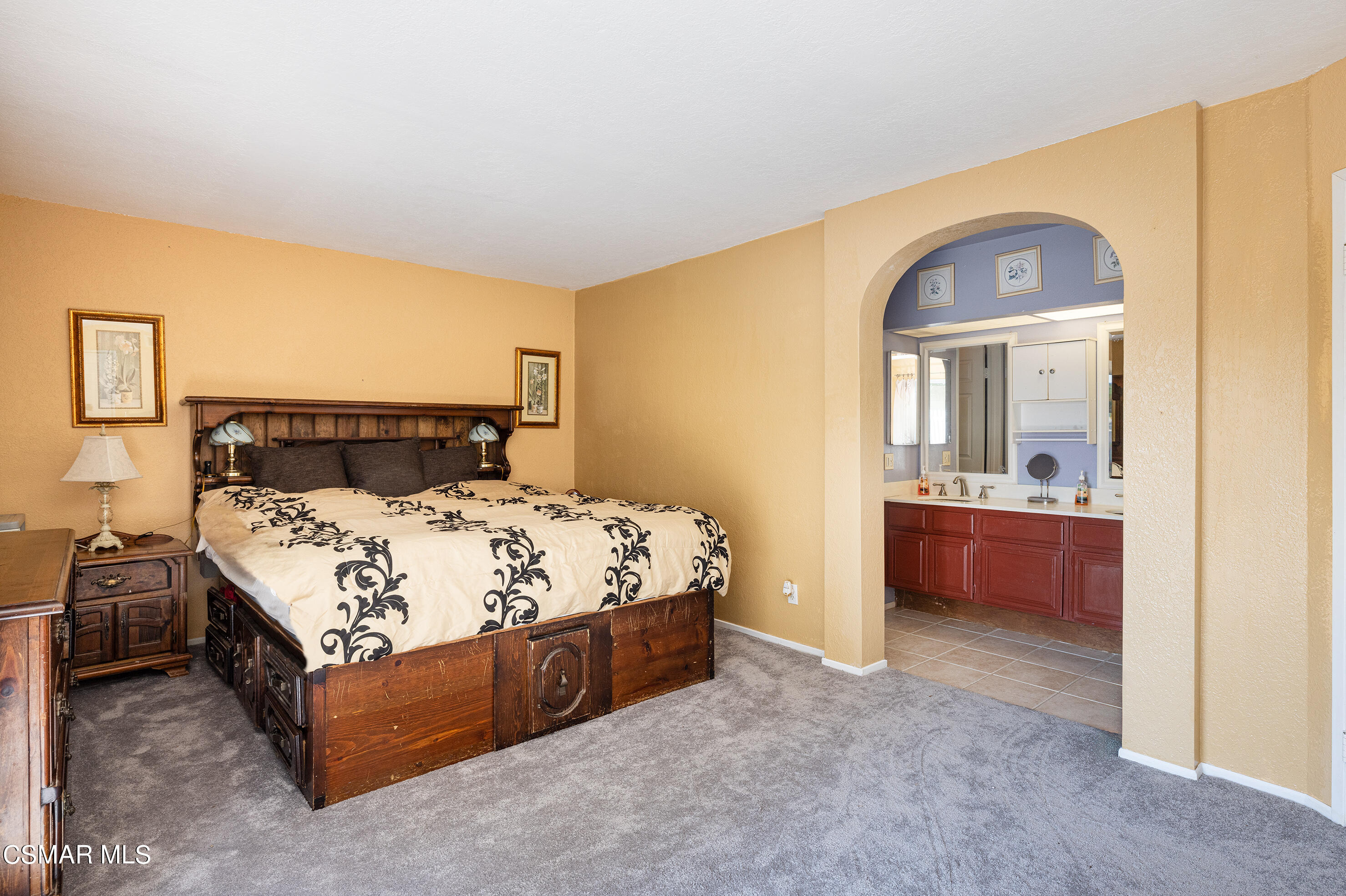 434 Algonquin Drive Simi Valley, CA 93065 - Photo 17 of 30 a bedroom with a bed and a view of bathroom