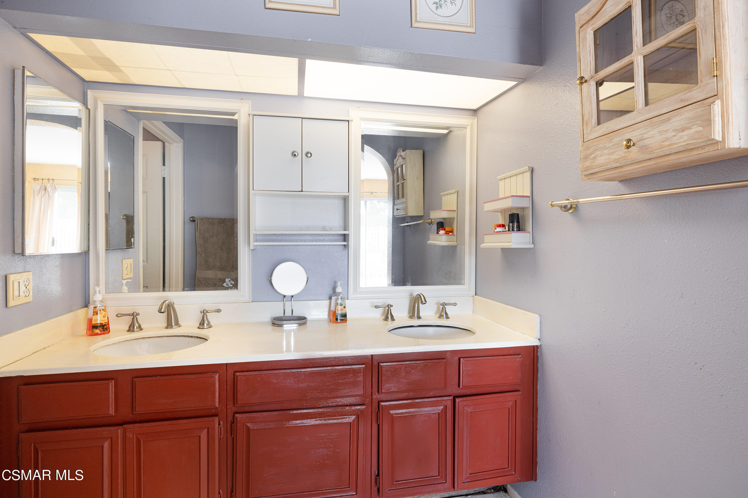 434 Algonquin Drive Simi Valley, CA 93065 - Photo 18 of 30 a bathroom with a sink and a mirror