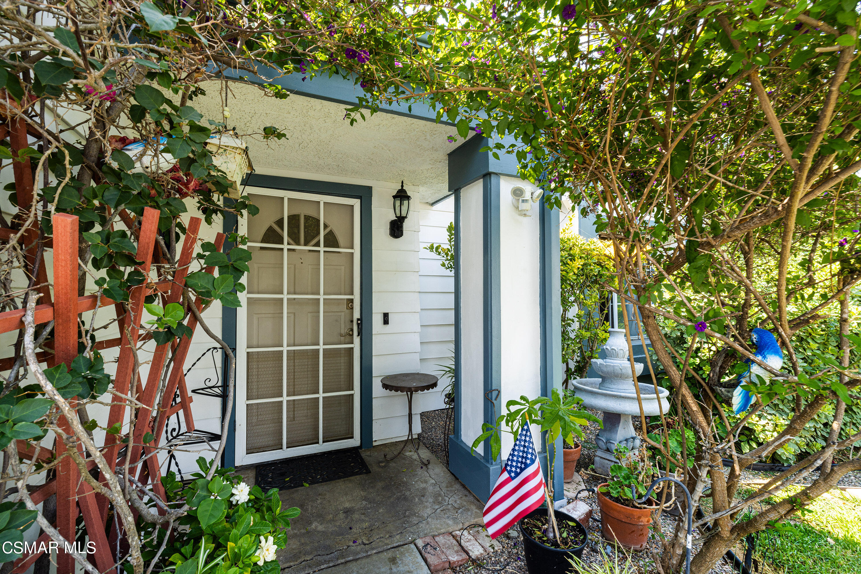 434 Algonquin Drive Simi Valley, CA 93065 - Photo 3 of 30 a view of a house with a potted plant and a large tree
