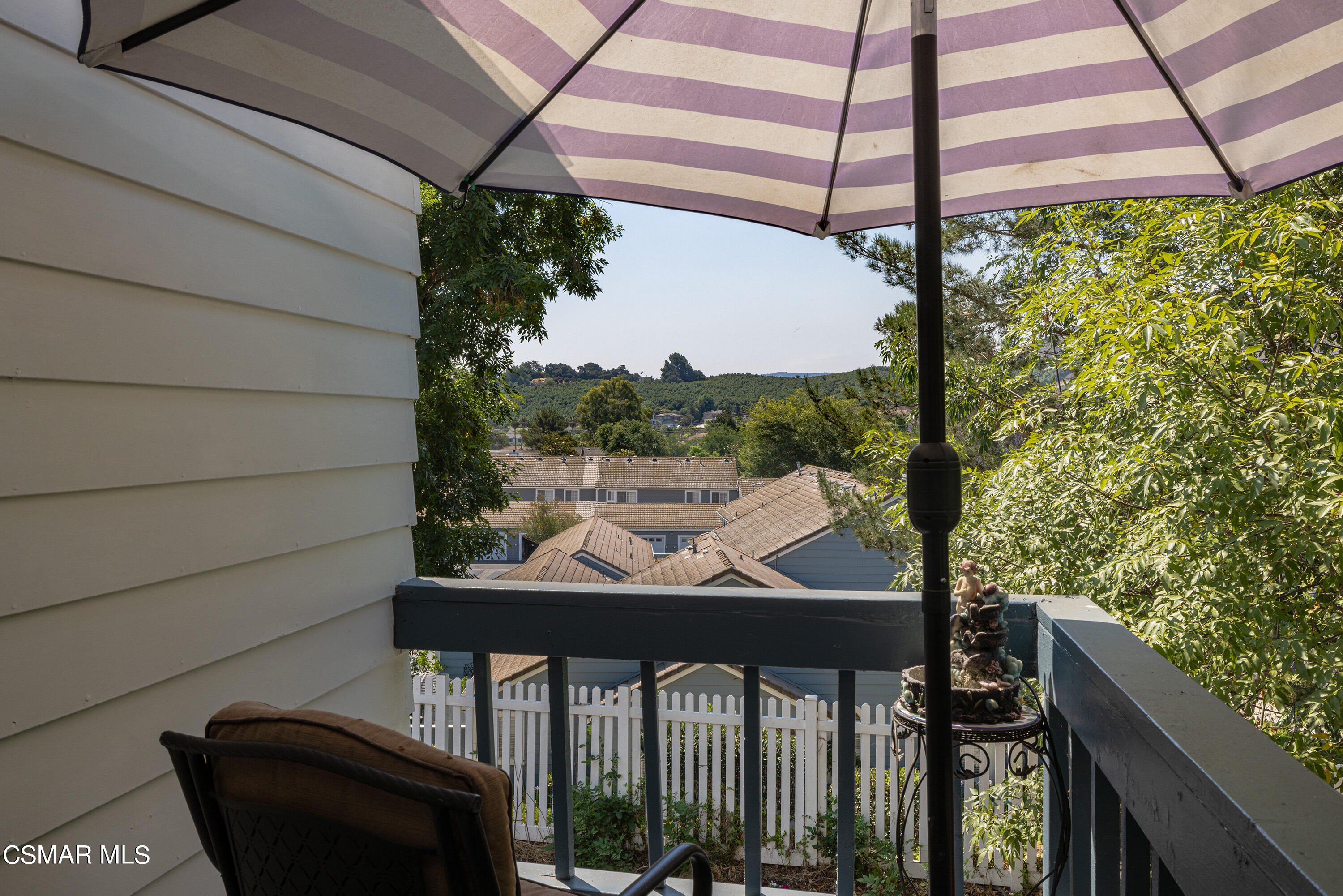 434 Algonquin Drive Simi Valley, CA 93065 - Photo 8 of 30 a view of a balcony with chair and wooden fence