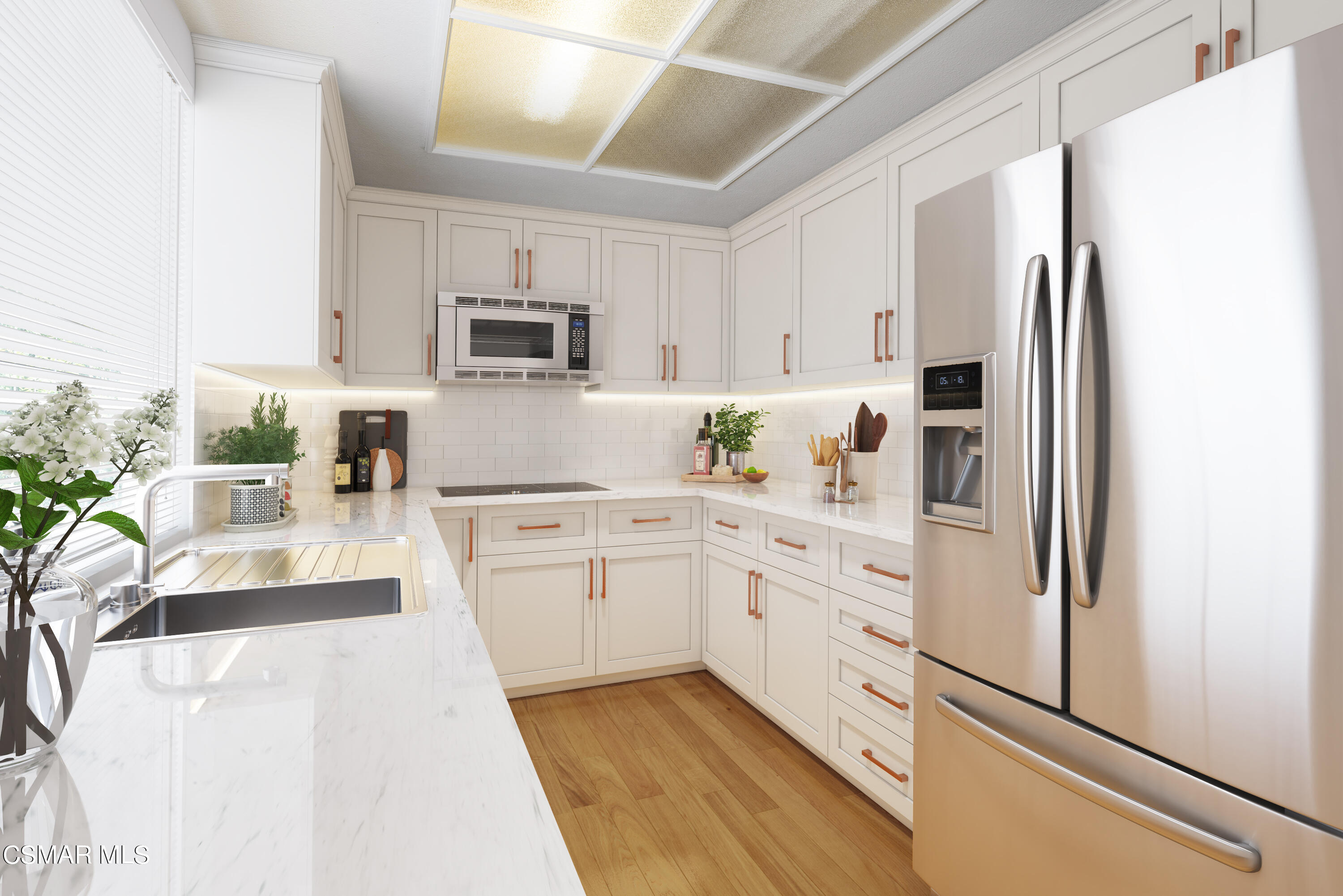 434 Algonquin Drive Simi Valley, CA 93065 - Photo 10 of 30 a kitchen with white cabinets and stainless steel appliances