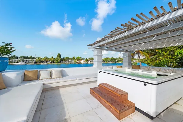 a view of swimming pool with a lounge chair