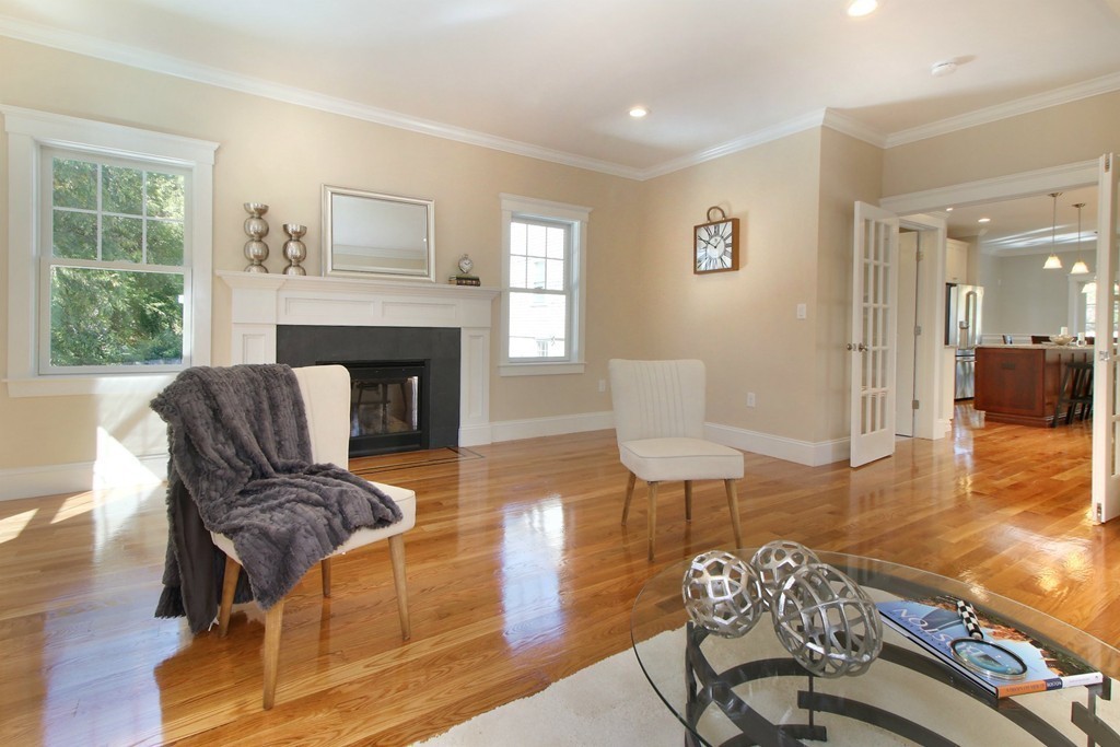 198 Overlook Road Arlington, MA 02474 - Photo 11 of 25 a living room with furniture and a fireplace