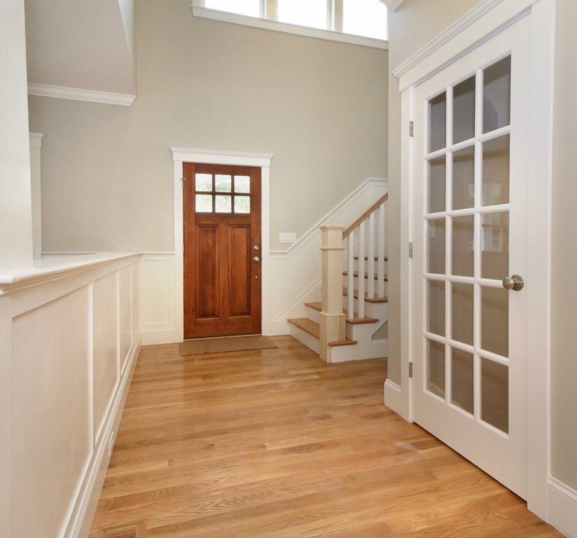 198 Overlook Road Arlington, MA 02474 - Photo 12 of 25 a view of an empty room with wooden floor and windows