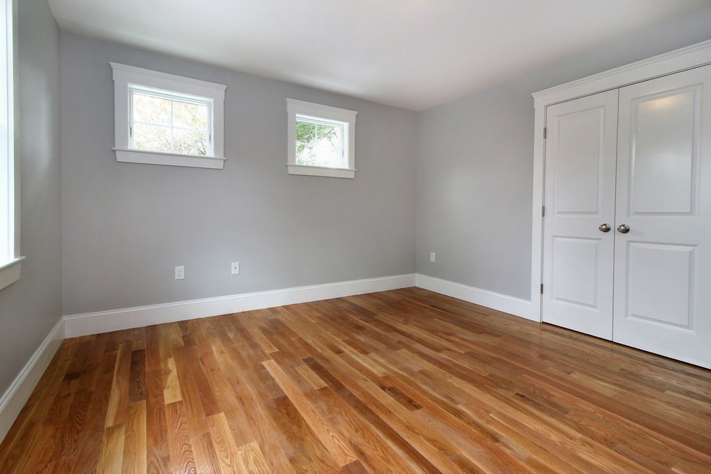 198 Overlook Road Arlington, MA 02474 - Photo 16 of 25 wooden floor in an empty room with a window