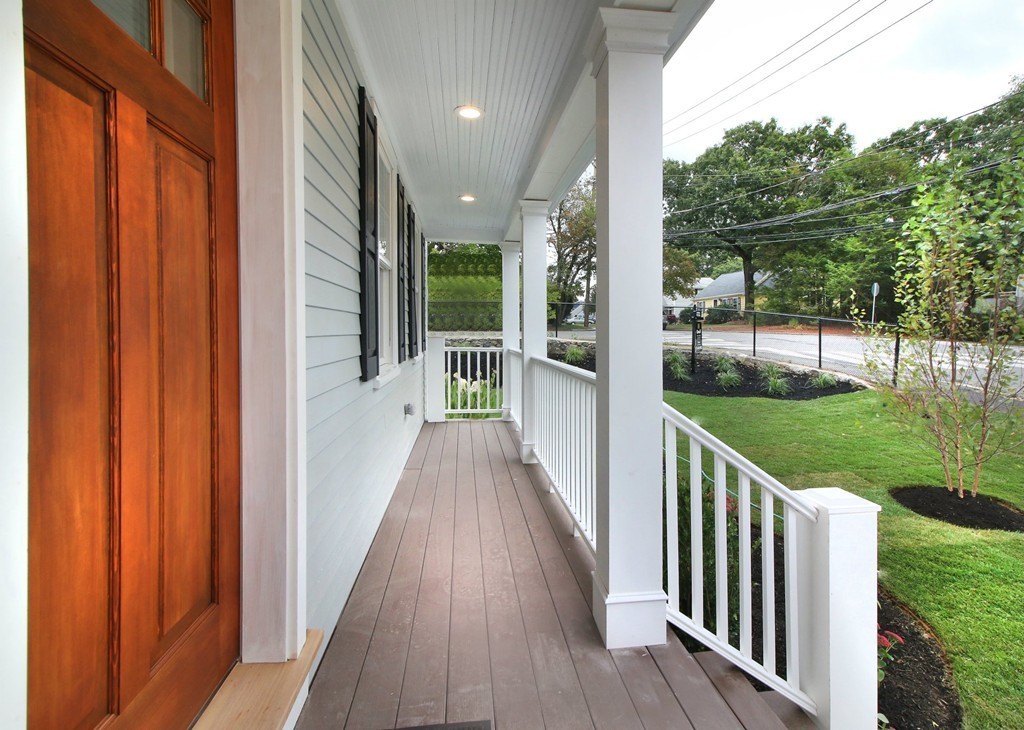 198 Overlook Road Arlington, MA 02474 - Photo 2 of 25 a view of a porch with wooden floor and fence