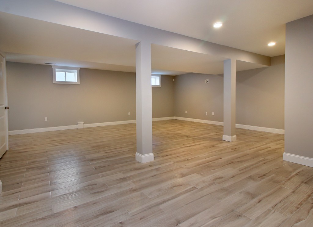 198 Overlook Road Arlington, MA 02474 - Photo 23 of 25 an empty room with wooden floor & windows