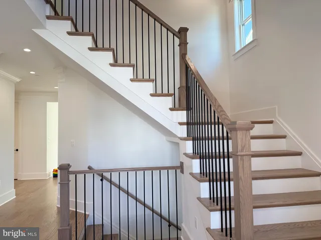 a view of entryway with wooden floor
