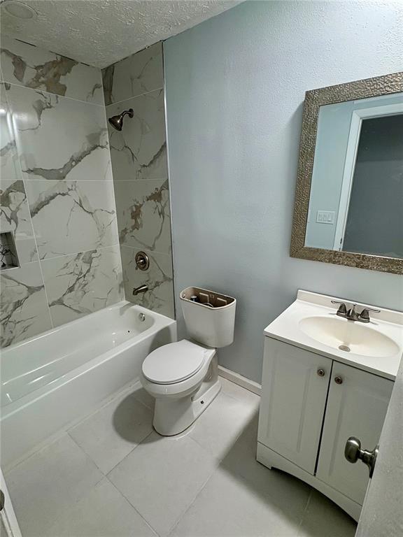 5401 Hansel Avenue, Unit 2 Orlando, FL 32809 - Photo 16 of 25 a bathroom with a sink a toilet and a bathtub