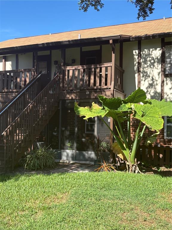 5401 Hansel Avenue, Unit 2 Orlando, FL 32809 - Photo 18 of 25 a view of a house with yard and a patio