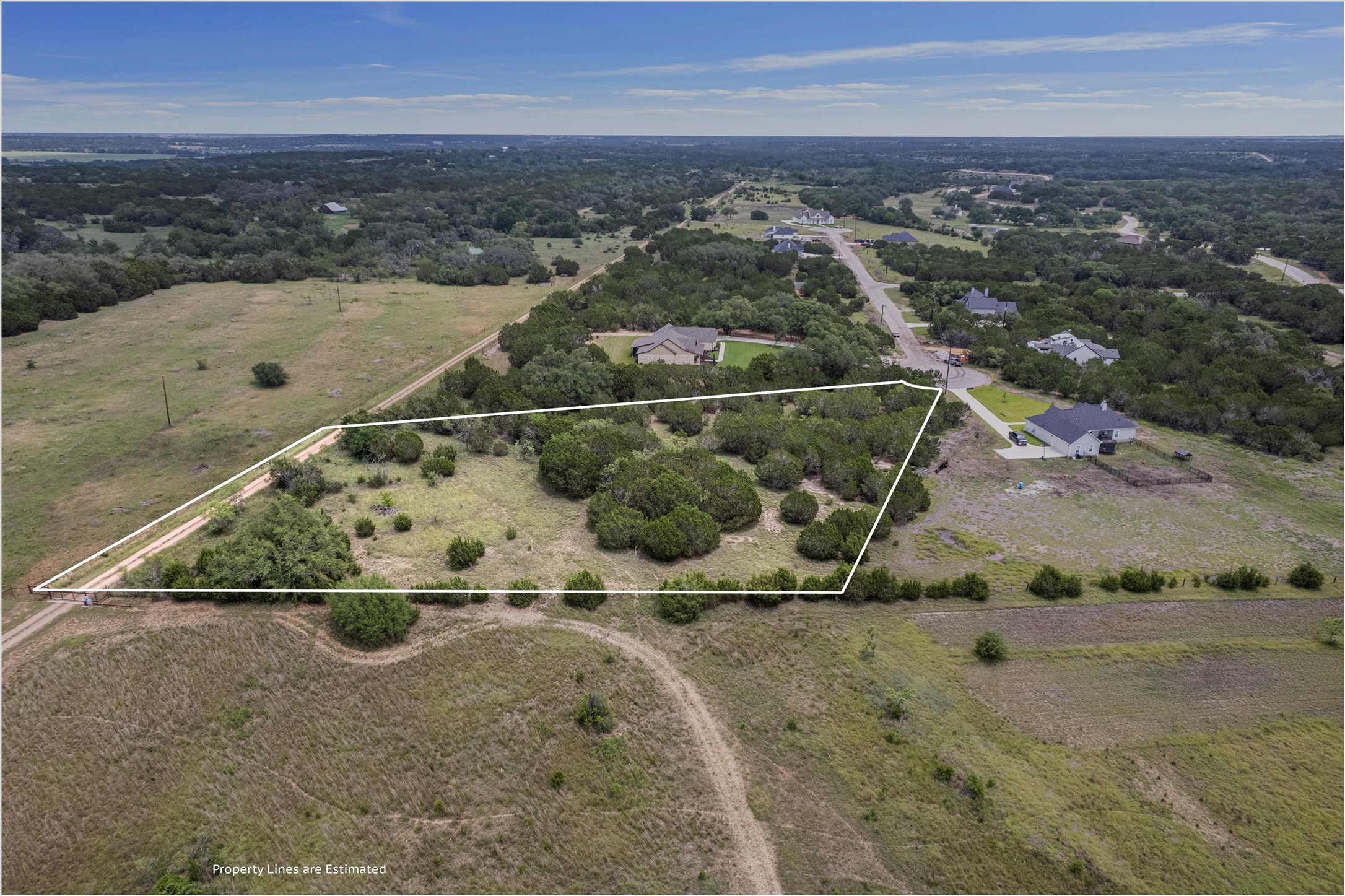 Lot 21 Rosebud Ranch Road Bertram, TX 78605 - Photo 11 of 18 an aerial view of a house with a yard