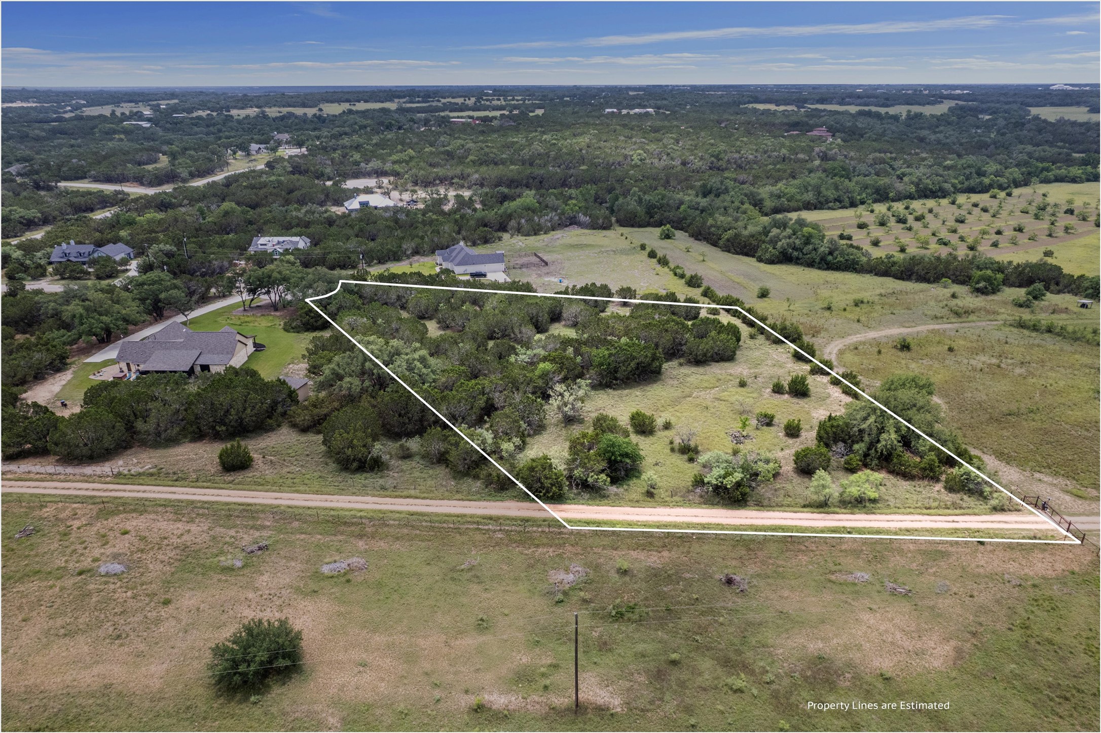 Lot 21 Rosebud Ranch Road Bertram, TX 78605 - Photo 16 of 18 an aerial view of a house