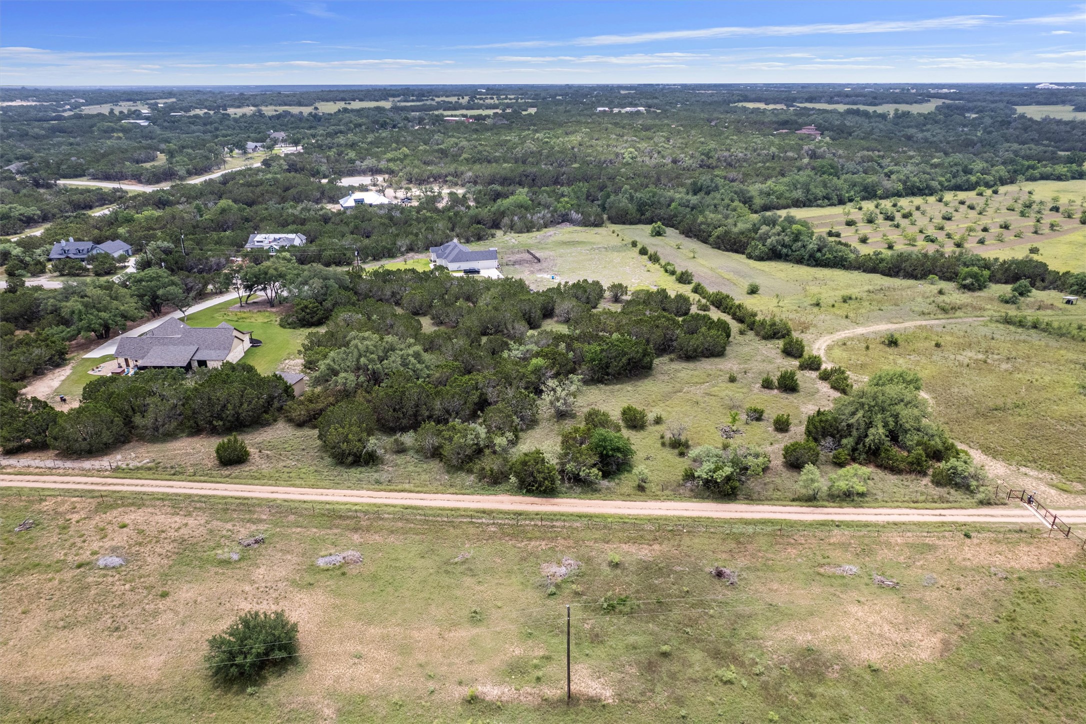 Lot 21 Rosebud Ranch Road Bertram, TX 78605 - Photo 17 of 18 a view of a big yard with a mountain