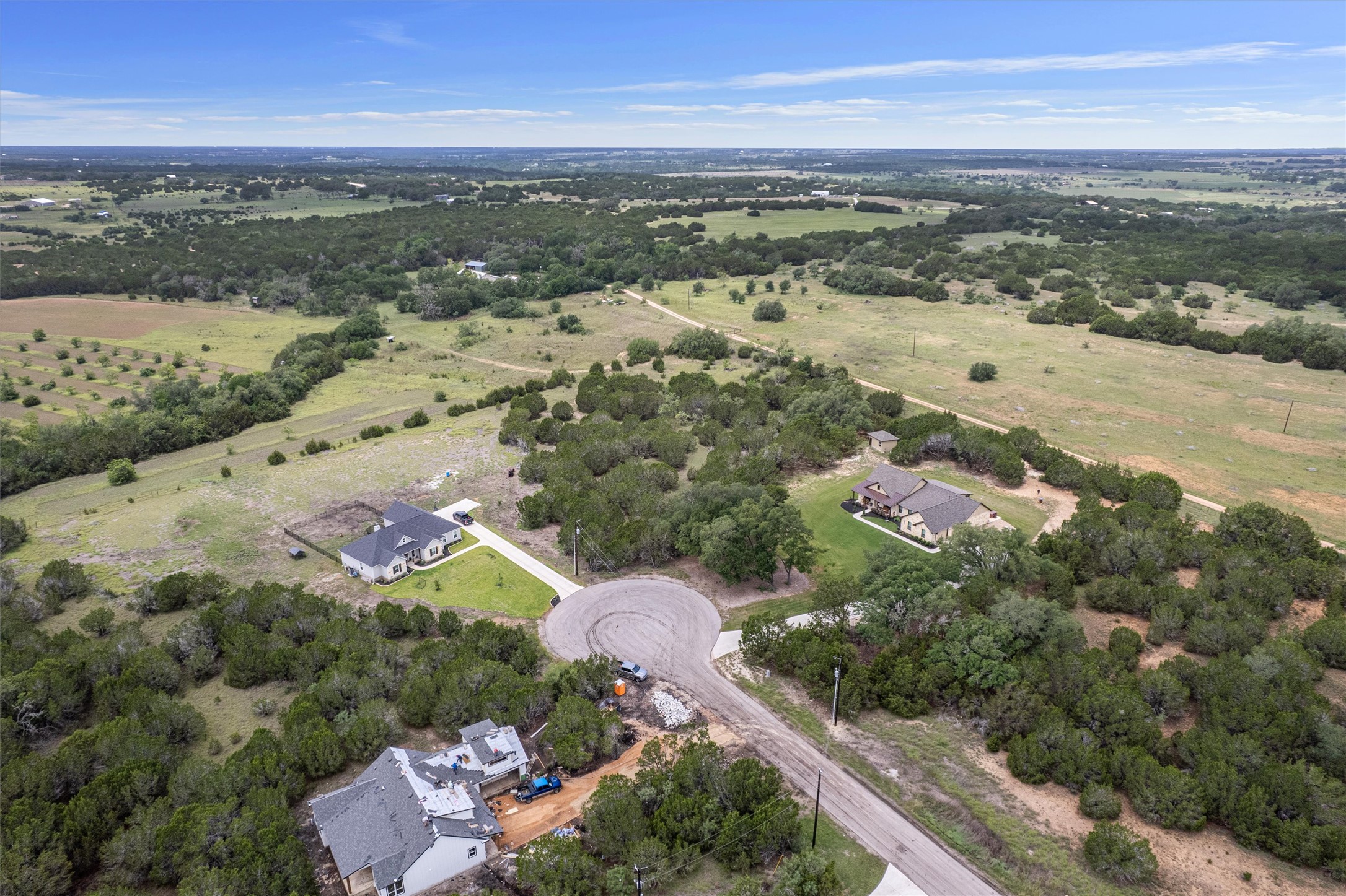 Lot 21 Rosebud Ranch Road Bertram, TX 78605 - Photo 6 of 18 an aerial view of ocean and residential houses with outdoor space