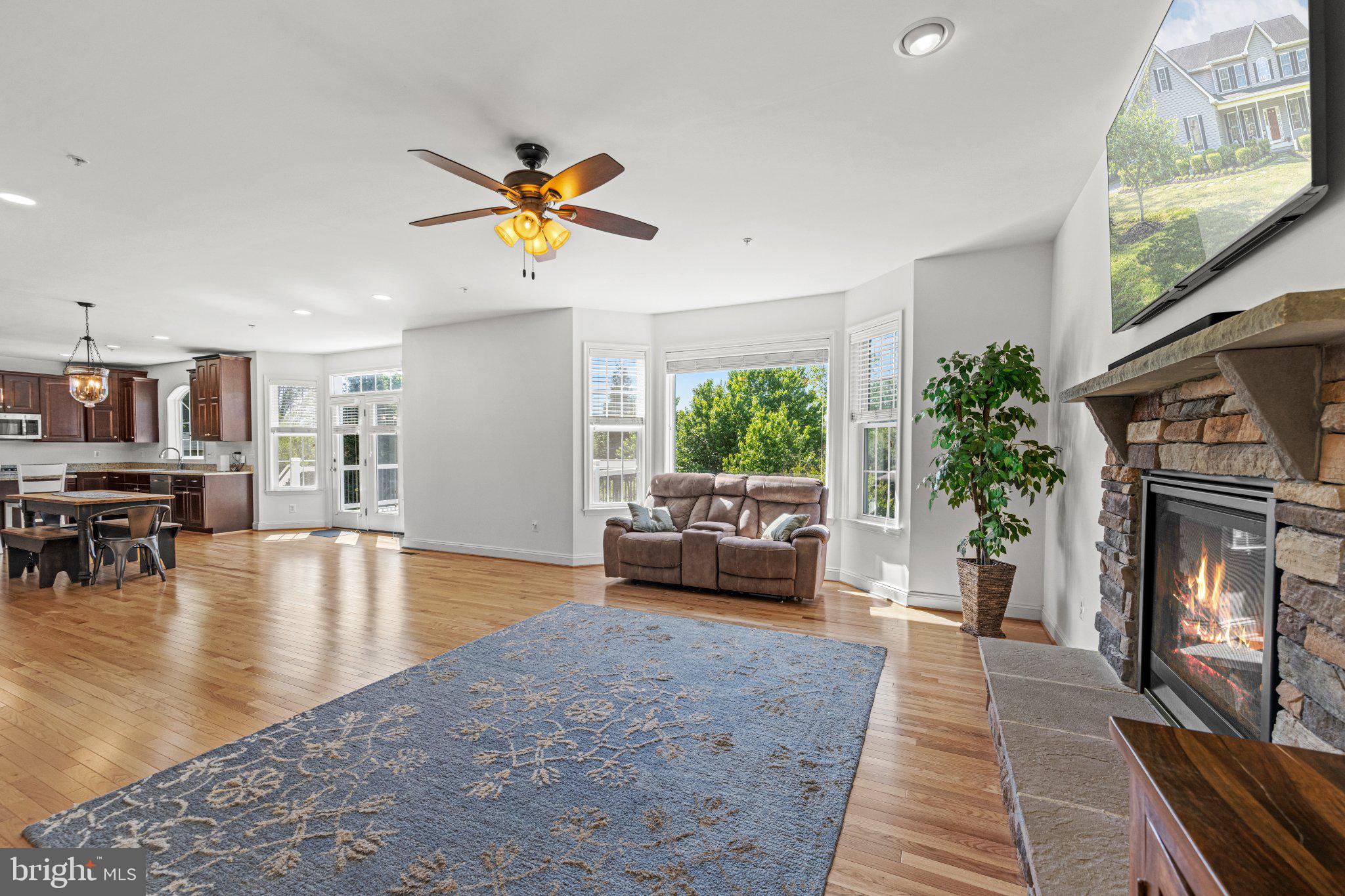 10693 Harding Road Laurel, MD 20723 - Photo 23 of 55 Large Family Room with Gas Fireplace and Hardwoods
