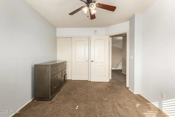 a view of empty room with windows