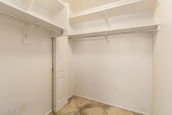 a bathroom with a sink double vanity and a mirror