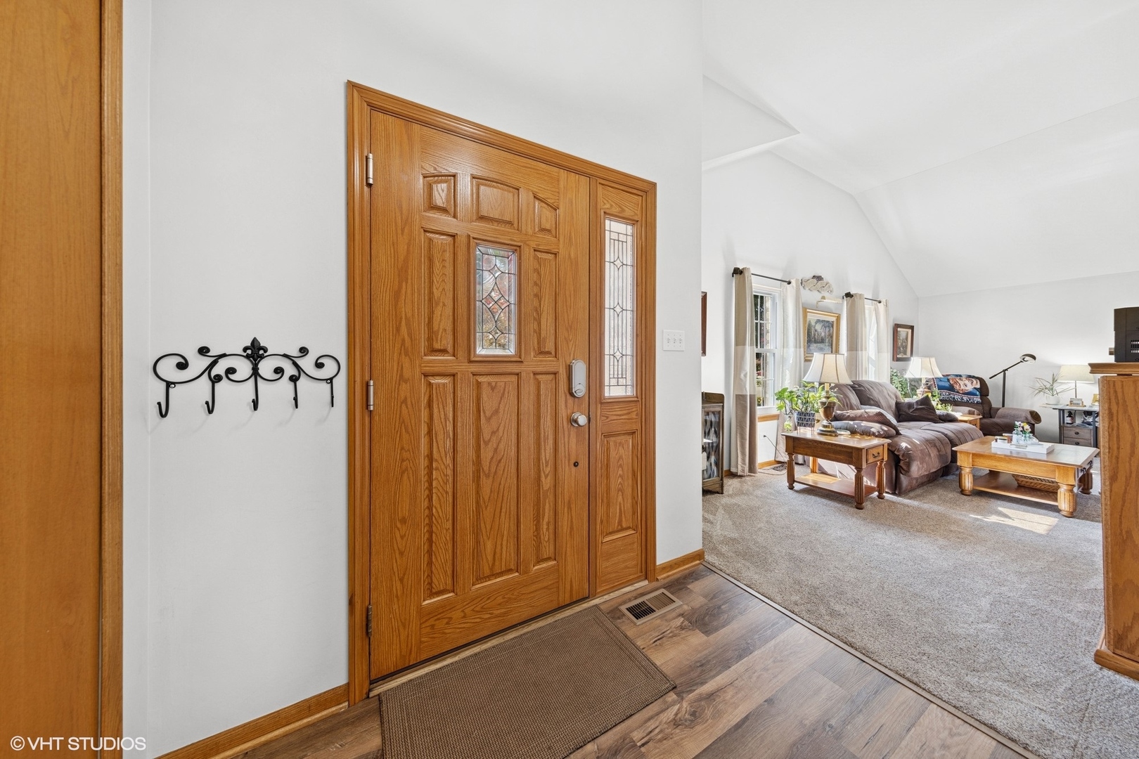 1908 Chestnut Hill Road Plainfield, IL 60586 - Photo 2 of 30 a view of a livingroom with entryway and furniture